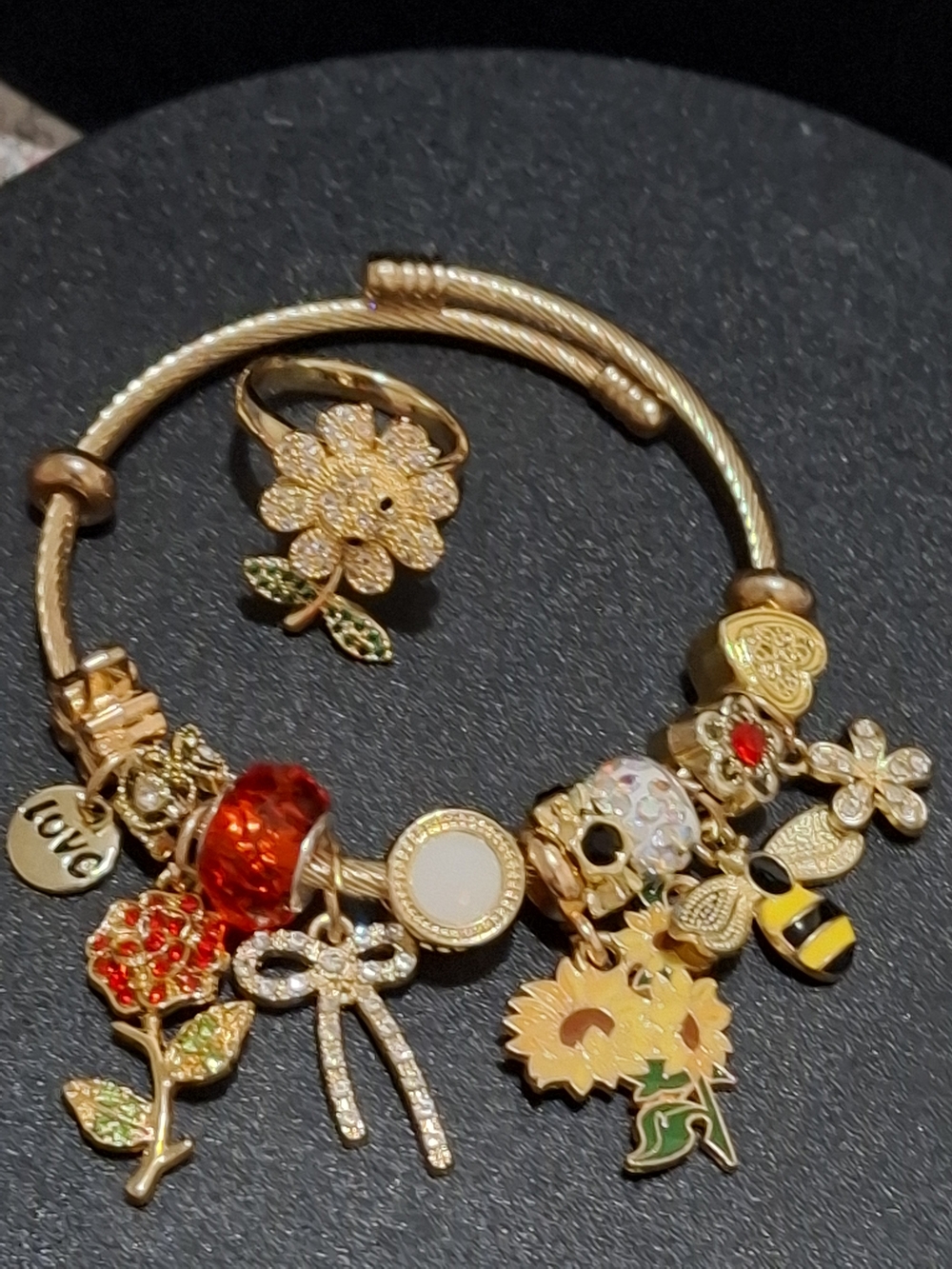 Gold-Tone Floral & Charm Bracelet with Red Accents